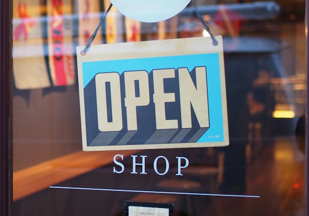 gray and blue Open signage