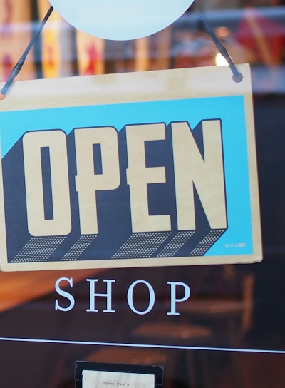 gray and blue Open signage