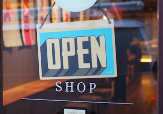 gray and blue Open signage