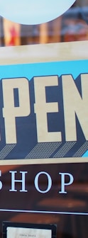 gray and blue Open signage