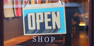 gray and blue Open signage