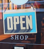 gray and blue Open signage