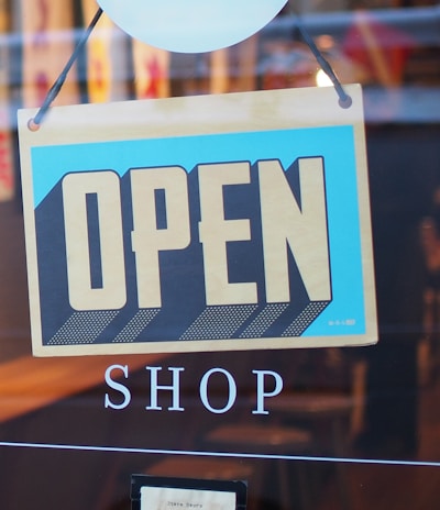 gray and blue Open signage