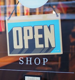 gray and blue Open signage