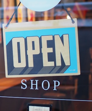 gray and blue Open signage