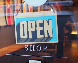 gray and blue Open signage