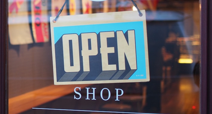 gray and blue Open signage