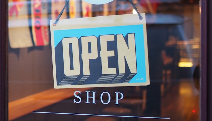 gray and blue Open signage