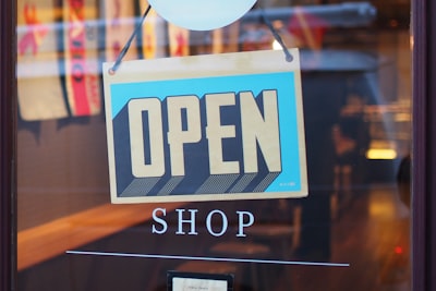 gray and blue open signage store zoom background