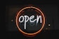 white and orange open LED signage turned on