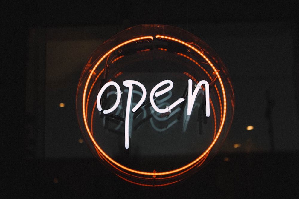 white and orange open LED signage turned on