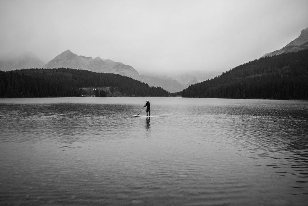 silhouette of person on body of water