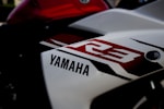 white Yamaha R3 motorcycle