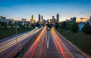 timelapse photo of highway during golden hour