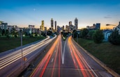 timelapse photo of highway during golden hour