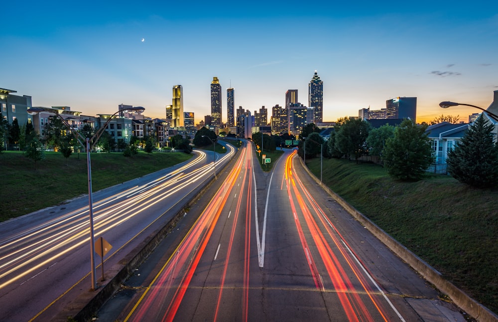 timelapse photo of highway during golden hour