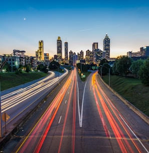 timelapse photo of highway during golden hour