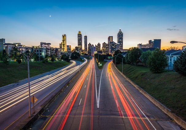 timelapse photo of highway during golden hour