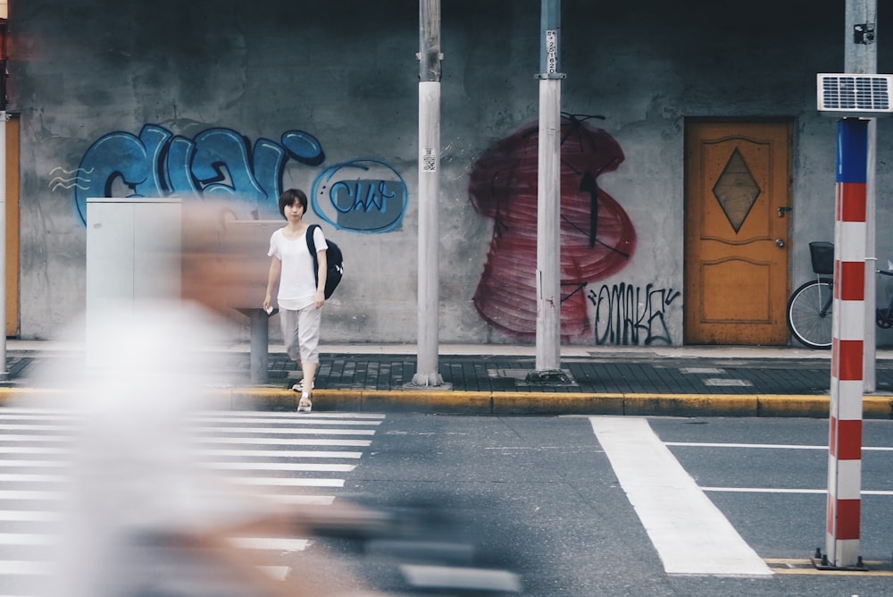 woman wearing white crew-neck T-shirt