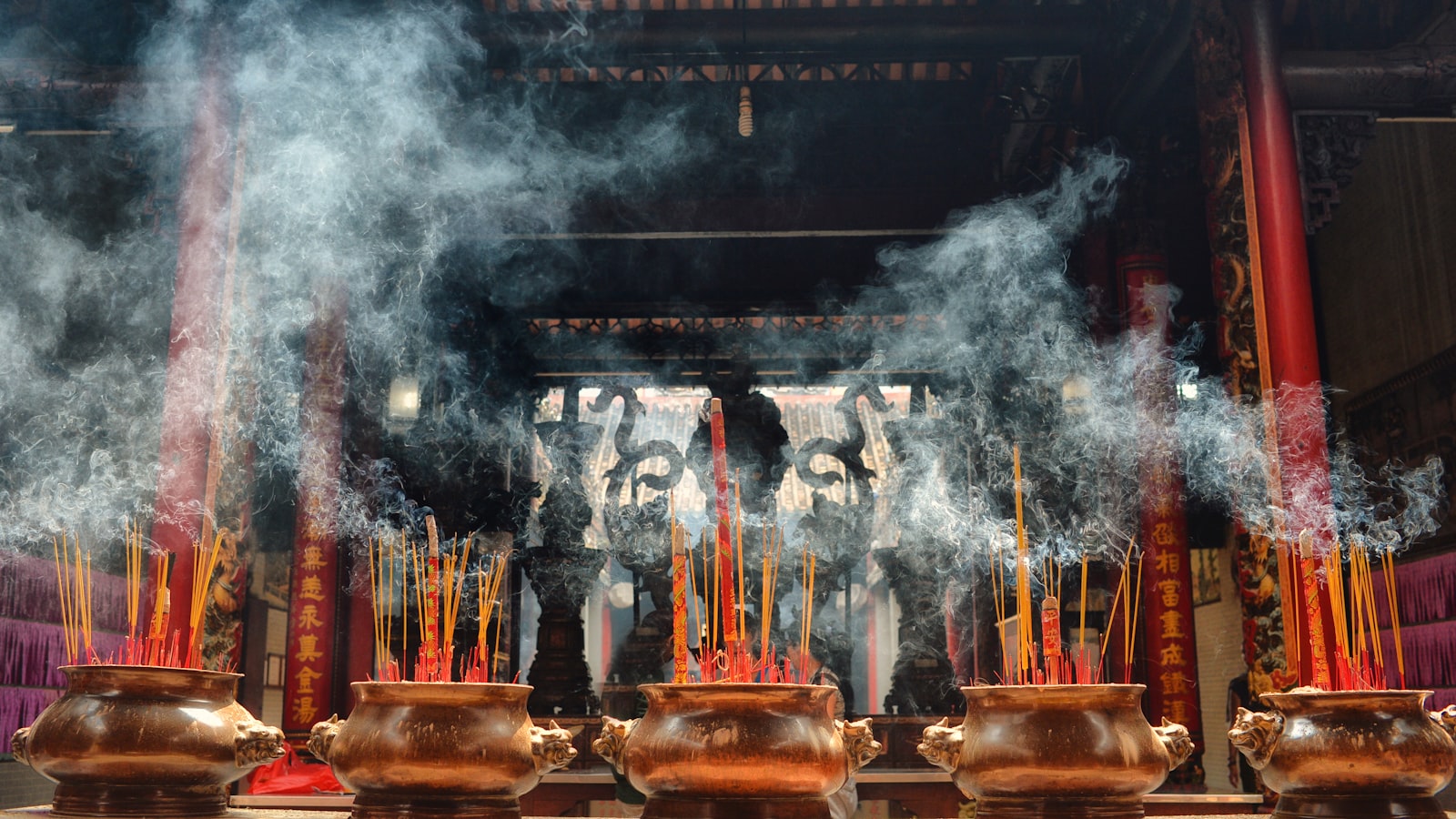 Nikon D4 sample photo. Incense on brown vases photography