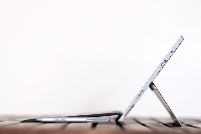 Close-up of a laptop with a tilted screen, highlighting the importance of technology