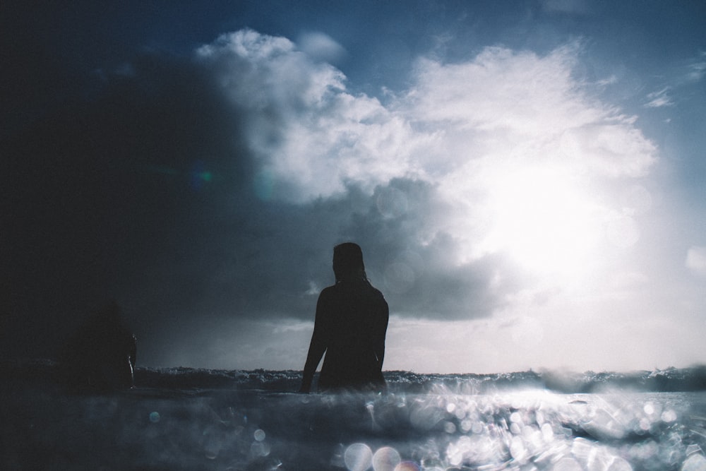 person on body of water during daytime