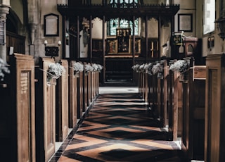 wooden pew near altar