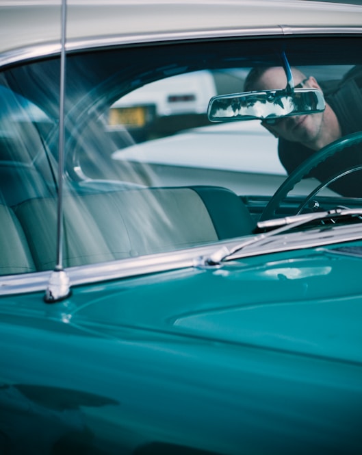 person looking at vehicle interior