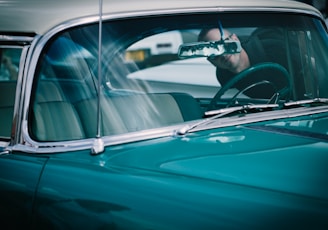 person looking at vehicle interior