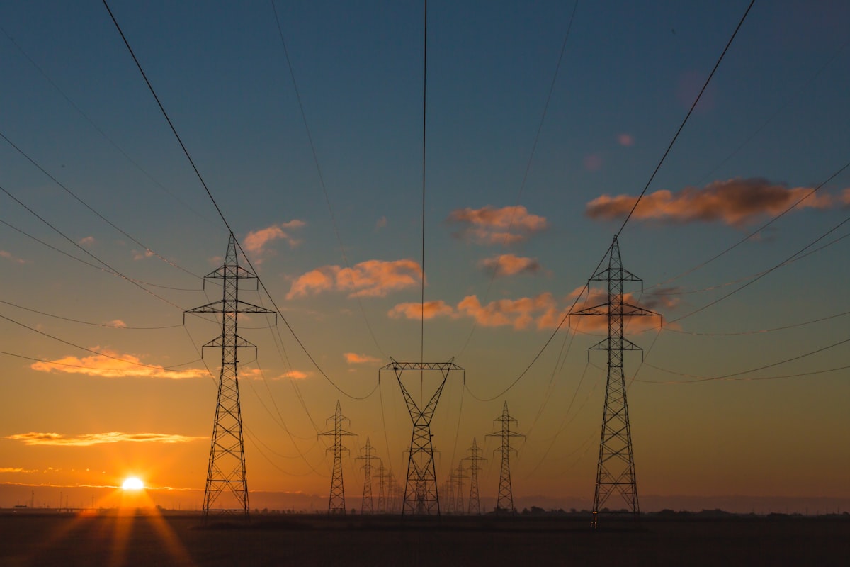 Power pylons at sunset