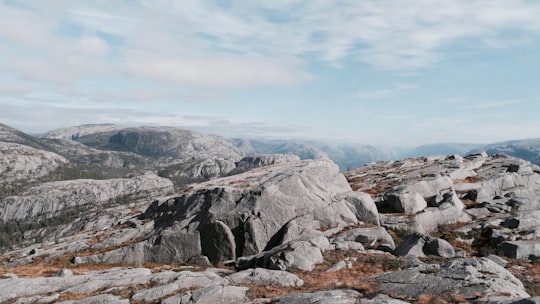 gray stone mountain during daytime in Lysefjorden Norway