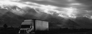 white trailer truck on road