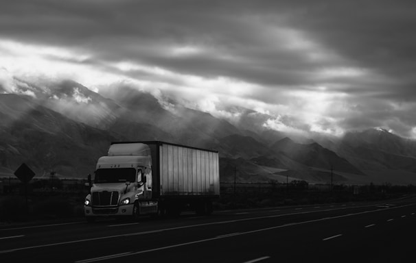 white trailer truck on road