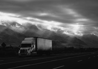 white trailer truck on road