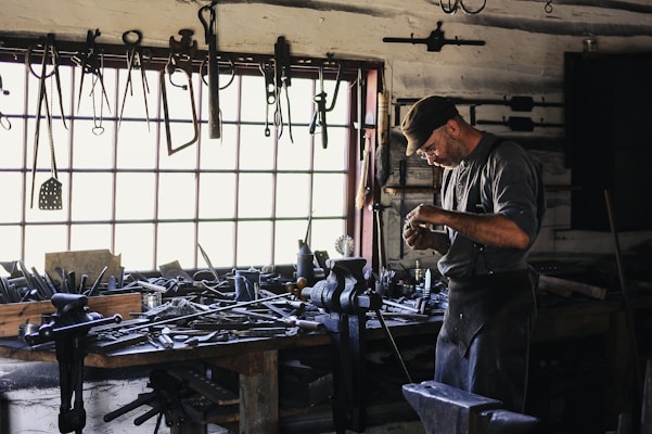 man inside tool shed