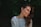 shallow focus photography of woman in gray sweater