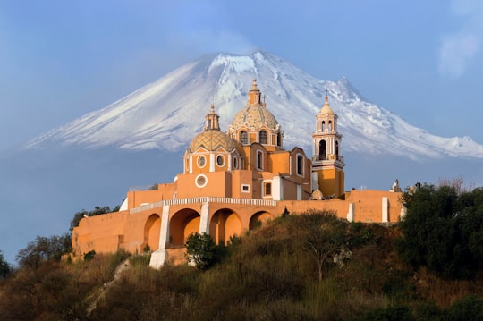 aerial photography of orange cathedral in Cholula, Puebla Mexico