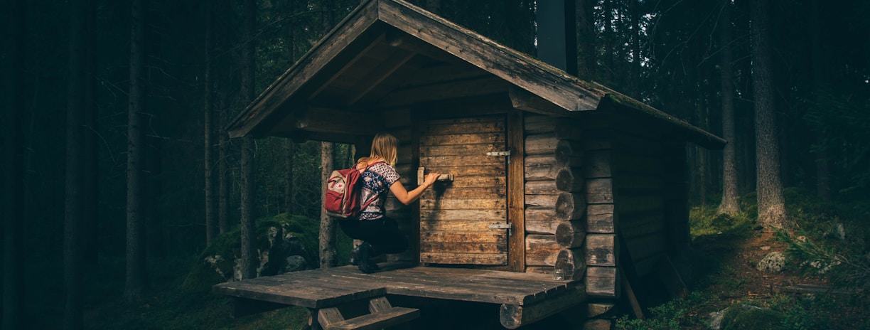 girl knocking on wooden door