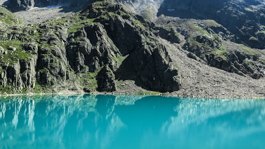 lake along body of mountain in Blaue Lacke Austria