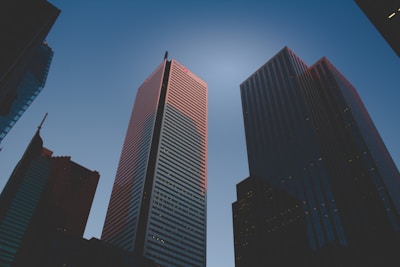 worm's eye view of high-rise city buildings during daytime