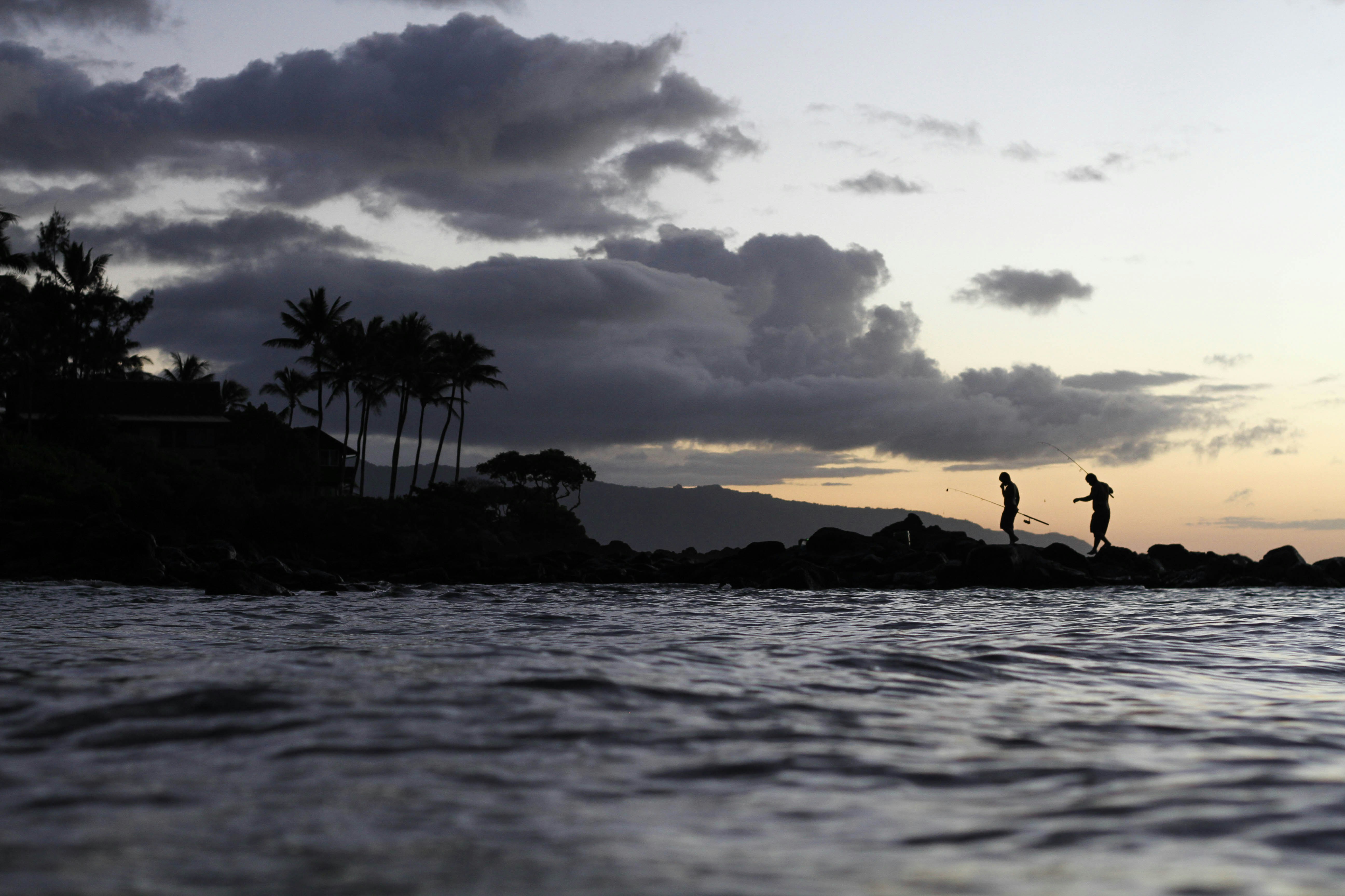 People out in the ocean in Hawaii.