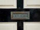 a close up of a door with a sign on it