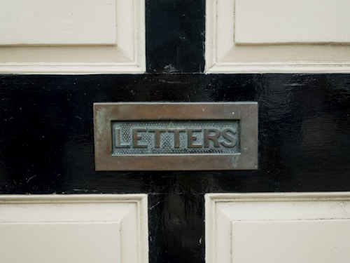 a close up of a door with a sign on it