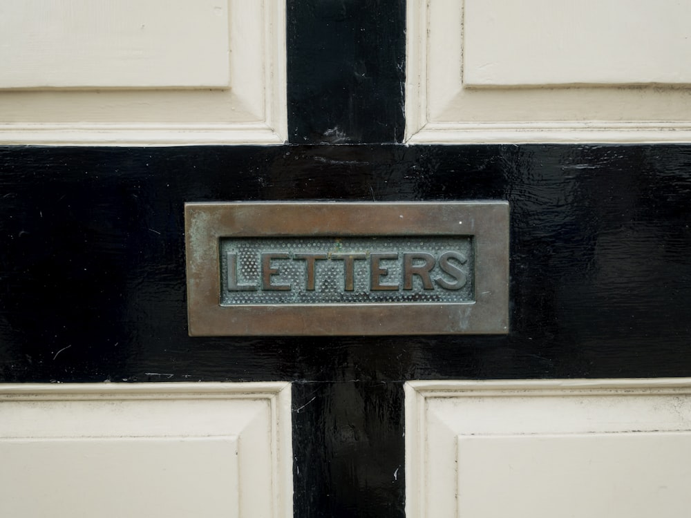 a close up of a door with a sign on it