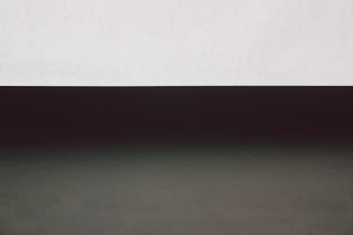 A minimalist composition with clean lines and subtle color gradients.