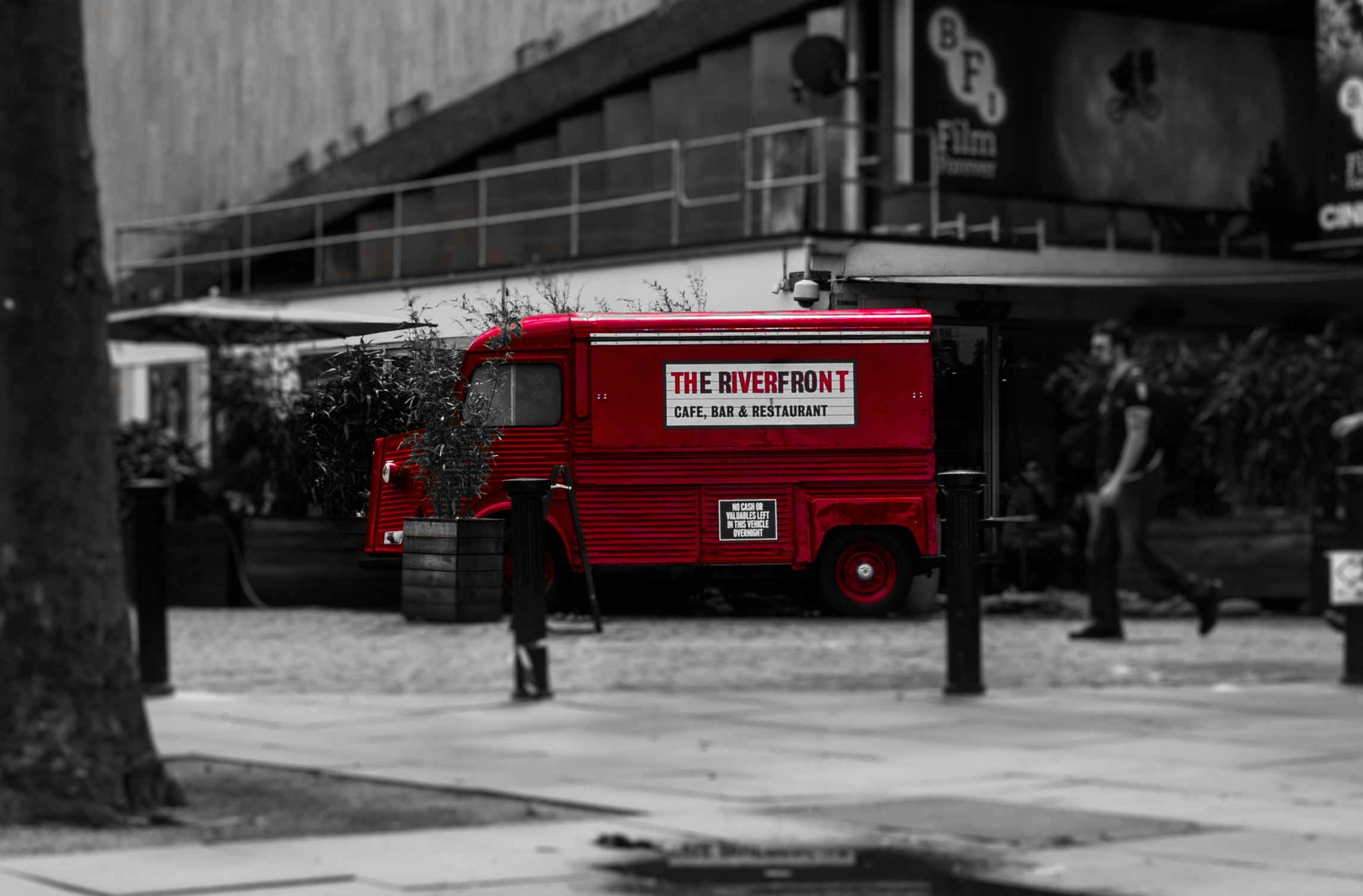 selective color photo of red van