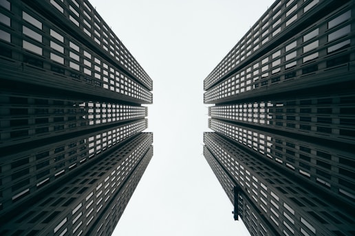 two gray high rise buildings