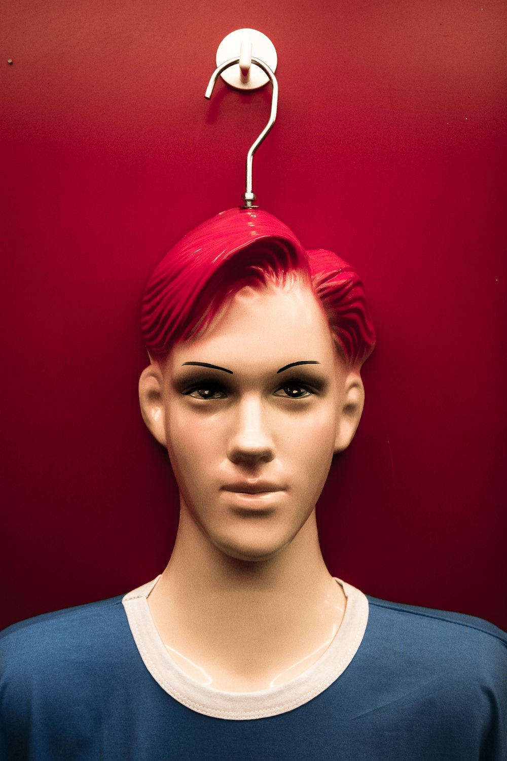 A redhaired mannequin.