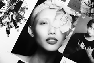 A monochrome collage featuring a prominent close-up of a woman's face with floral elements. Surrounding are smaller images and text fragments, creating an artistic and fashionable composition.