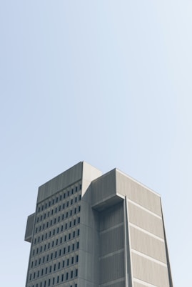 low angle photography of grey building